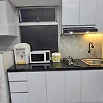 The Jarrdin Apartment Cihampelas By Nemui Room